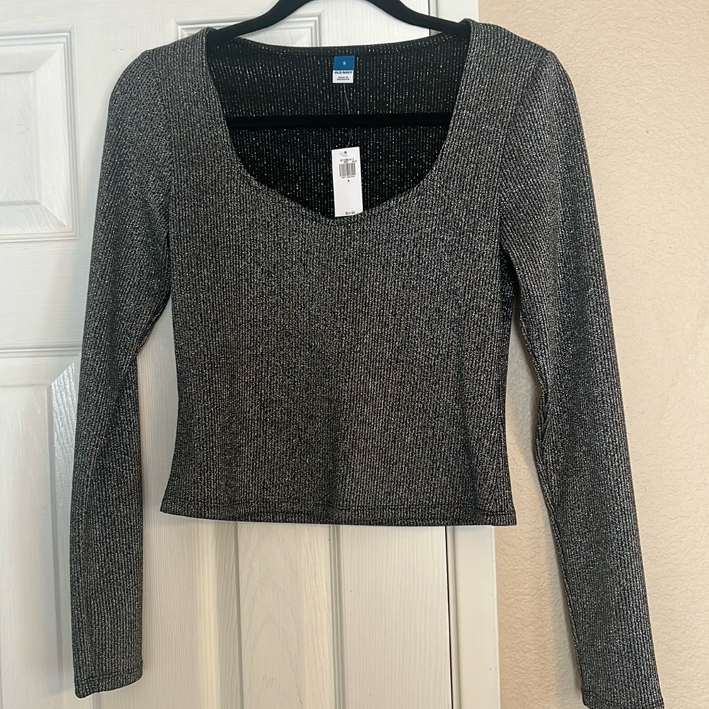Women’s size small shimmery long sleeved shirt